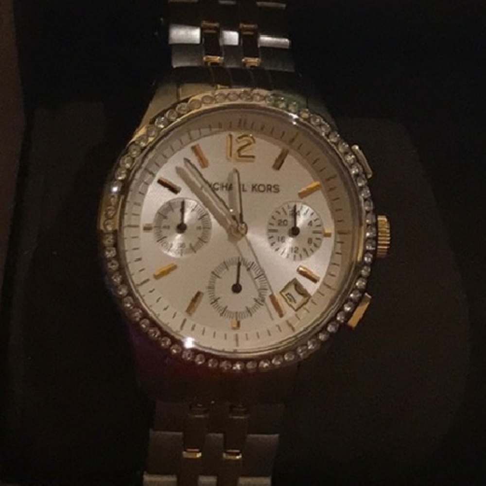 Large round faced two tone michael Kors watch